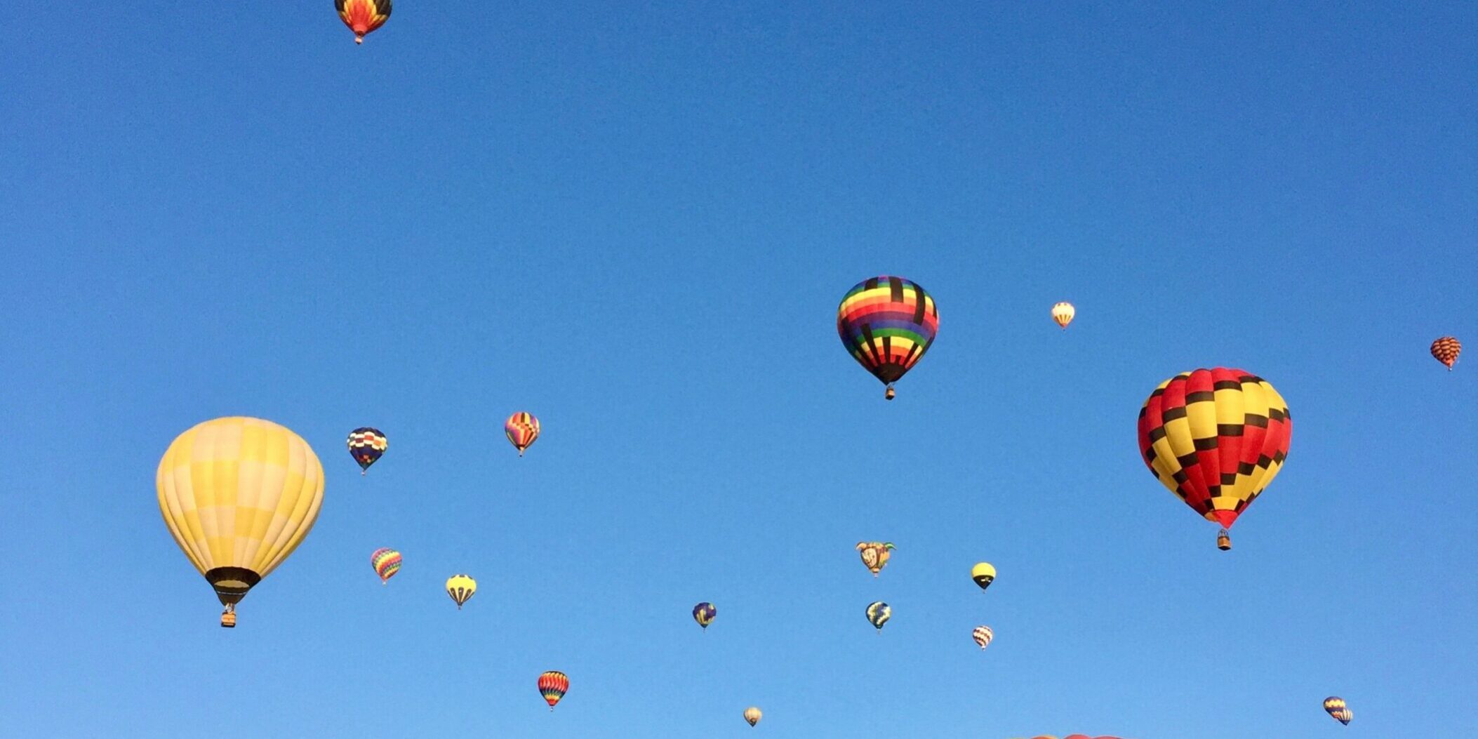Photo of hot air balloons by Stephanie Klepacki on Unsplash