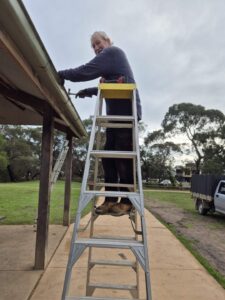 Club member Greg, doing a balancing act on his ladder.